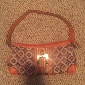 Brown and orange hand bag.